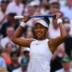 Naomi Osaka of Japan celebrates winning match point against Aryna Sabalenka of Belarus during the Ladies' Singles fourth round match on Day Seven of The Championships Wimbledon 2026 at All England Lawn Tennis and Croquet Club on July 05, 2026 in London, England.
