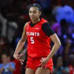 Angel Reese #5 of the Atlanta Dream reacts after a three pointer during the fourth quarter against the Los Angeles Sparks at Gateway Center.