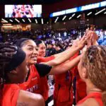 Angel Reese #5 and the Atlanta Dream celebrate after the game against the Los Angeles Sparks on July 13, 2026 at Gateway Center Arena at College Park in Atlanta, Georgia.