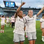 Ary Borges #8 and Claire Emslie #10 of Angel City FC celebrate following the team's victory in the NWSL match between San Diego Wave FC and Angel City FC