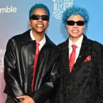 Natisha Hiedeman and Courtney Williams pose on the 2026 WNBA All Star orange carpet.