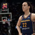 NBA 2K27 first look screenshot featuring Indiana Fever star Caitlin Clark posing on the court.
