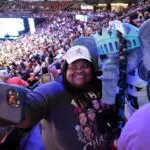 New York Liberty mascot Ellie the Elephant takes a photo with fan Sheena O during the WNBA All-Star Game Skills Challenge at Footprint Center in Phoenix on Friday, July 19, 2024.