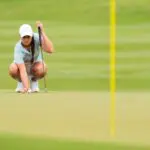 Kiara Romero, of Calif., lines up a putt on No. nine green during the second round of the Augusta National Women's Amateur at Champions Retreat.