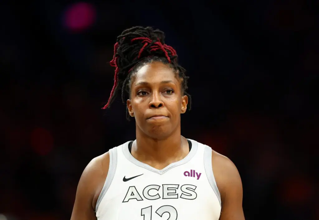 Las Vegas Aces guard Chelsea Gray (12) against the Phoenix Mercury during game three of the 2025 WNBA Finals at PHX Arena.