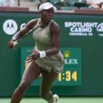 Victoria Mboko runs down a shot during round 2 win at the BNP Paribas Open at the Indian Wells Tennis Garden.