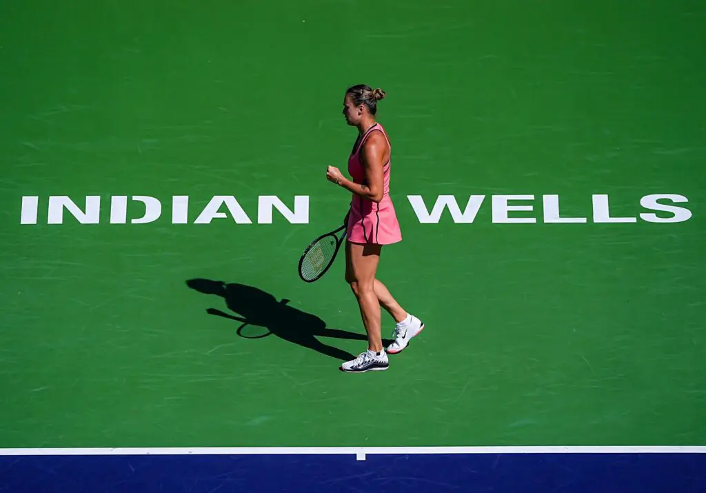 Aryna Sabalenka reacts to winning the second game against Elena Rybakina to tie 1-1 in the first set of the women’s singles championship final at the BNP Paribas Open in Indian Wells.