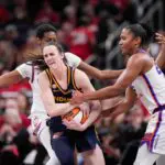 Phoenix Mercury forward Alyssa Thomas (25) attempts to strip the ball from Indiana Fever guard Caitlin Clark (22) on Monday, June 22, 2026, during the game at Gainbridge Fieldhouse in Indianapolis. The Indiana Fever defeated the Phoenix Mercury, 86-77.