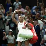 Serena Williams of the United States leaves the court after losing her match against Maya Joint of Australia on day two at All England Lawn Tennis and Croquet Club.