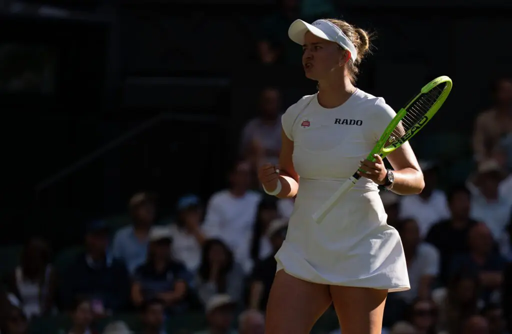 Barbora Krejcikova of the Czech Republic reacts during her match against Mirra Andreeva on day three at All England Lawn Tennis and Croquet Club.