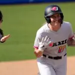 Reese Atwood of the Blaze celebrates after hitting a home run during an AUSL softball game between the Oklahoma City Spark and the Carolina Blaze at Oklahoma Christian University.