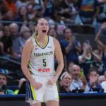 Dallas Wings guard Paige Bueckers (5) reacts after her basket and foul by the Connecticut Sun in the second half at PeoplesBank Arena.
