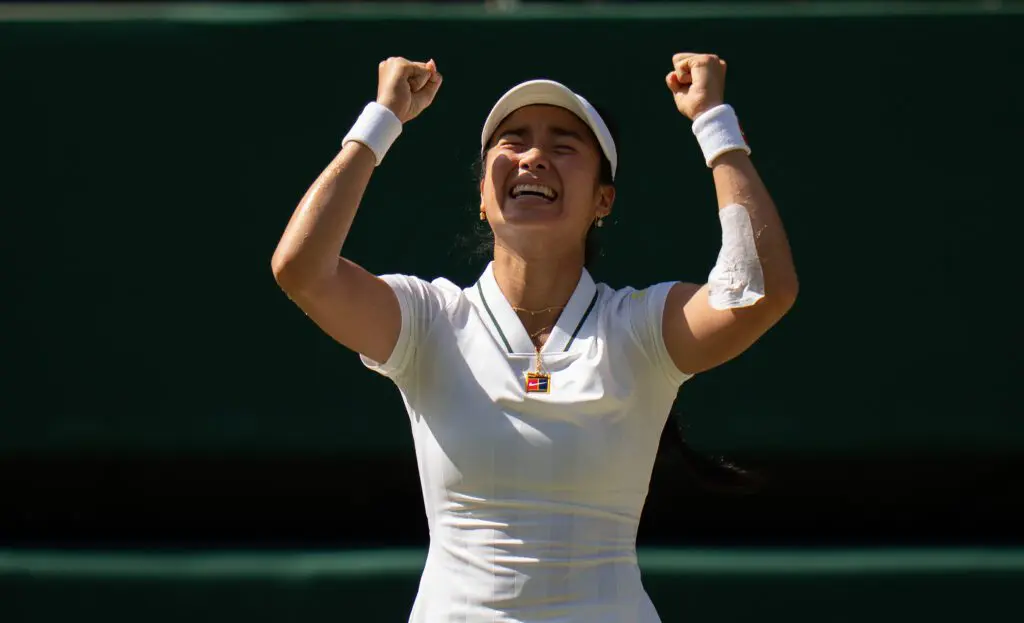 Alexandra Eala of the Philippinesr celebrates winning her match against Iga Swiatek of Poland on day six at All England Lawn Tennis and Croquet Club.