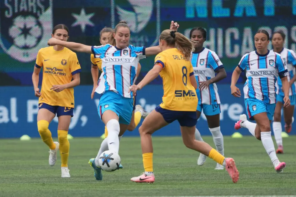 Utah Royals defender Kate del Fava (8) defends Chicago Stars FC forward Jordyn Huitema (99) during the first half at Northwestern Medicine Field at Martin Stadium.