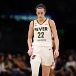 Indiana Fever guard Caitlin Clark (22) reacts to a play during the fourth quarter against the Los Angeles Sparks at Crypto.com Arena.