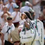 Coco Gauff of the United States leaves the court after losing her match against Karolina Muchova of the Czech Republic on day 11 at All England Lawn Tennis and Croquet Club.