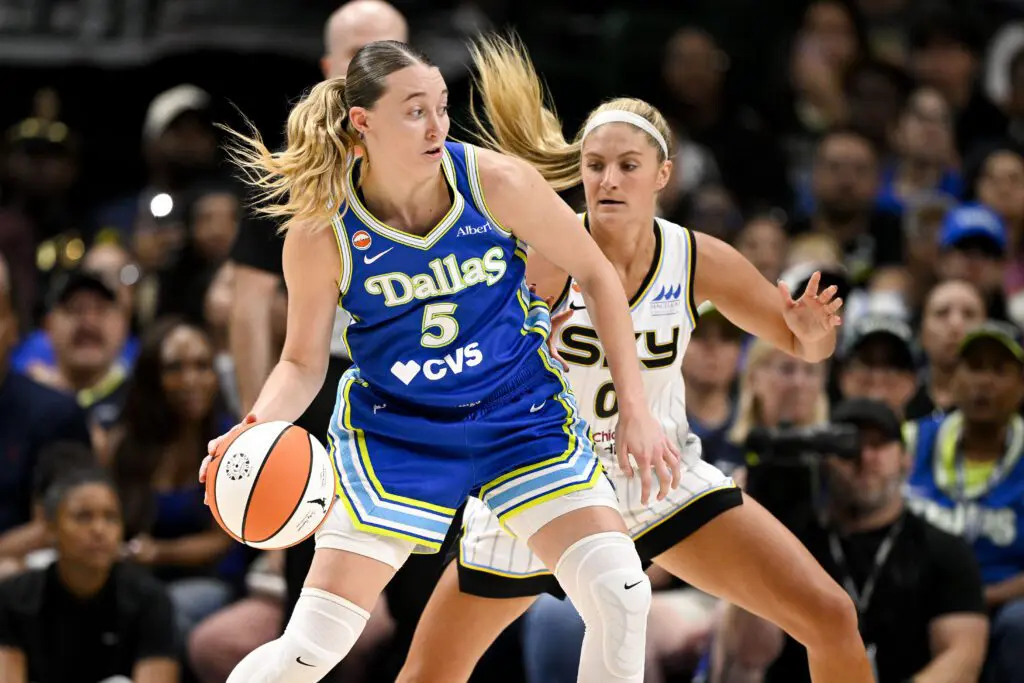 Dallas Wings guard Paige Bueckers (5) looks to move the ball past Chicago Sky guard Jacy Sheldon (0) during the second half at the American Airlines Center.