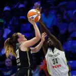 New York Liberty guard Sabrina Ionescu (20) has her shot blocked by Dallas Wings forward Awak Kuier (34) during the second half of Monday's Liberty vs Wings clash at College Park Center.