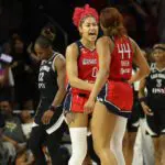 Washington Mystics center Shakira Austin (0) celebrates with Mystics forward Kiki Iriafen (44) after their game against the Las Vegas Aces at CareFirst Arena.