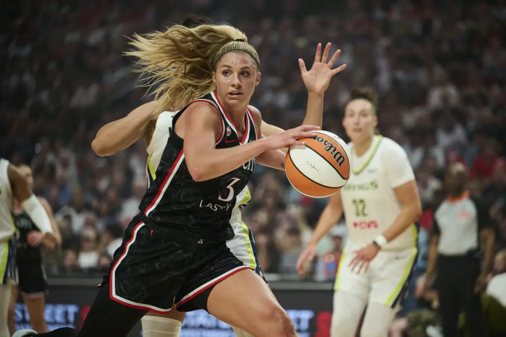 Portland Fire guard Sarah Ashlee Barker (3) drives to the basket during the first half against the Dallas Wings at Moda Center.