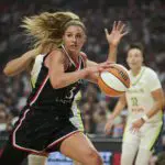 Portland Fire guard Sarah Ashlee Barker (3) drives to the basket during the first half against the Dallas Wings at Moda Center.
