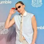 Paige Bueckers poses on the 2026 WNBA All-Star Game orange carpet.