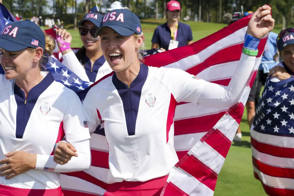 Nelly Korda of Team USA celebrates after defeating Team Europe for the Solheim Cup at Robert Trent Jones Golf Club.