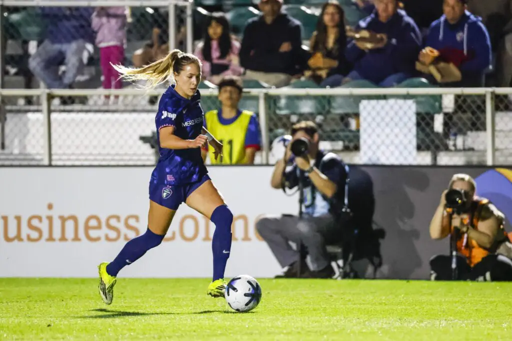 North Carolina Courage midfielder Ashley Sanchez (2) dribbles the ball during the first half of the game against the Racing Louisville FC at First Horizon Stadium at WakeMed Soccer Park.