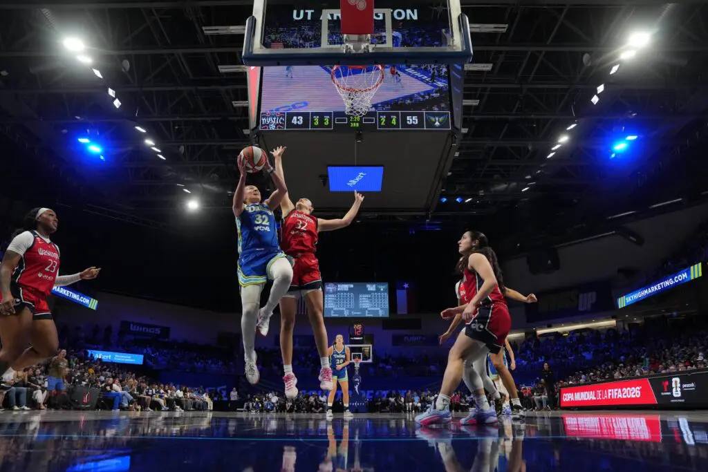 Dallas Wings forward Jessica Shepard (32) shoots the ball against Washington Mystics forward Angela Dugalic (32) during the second half at College Park Center.