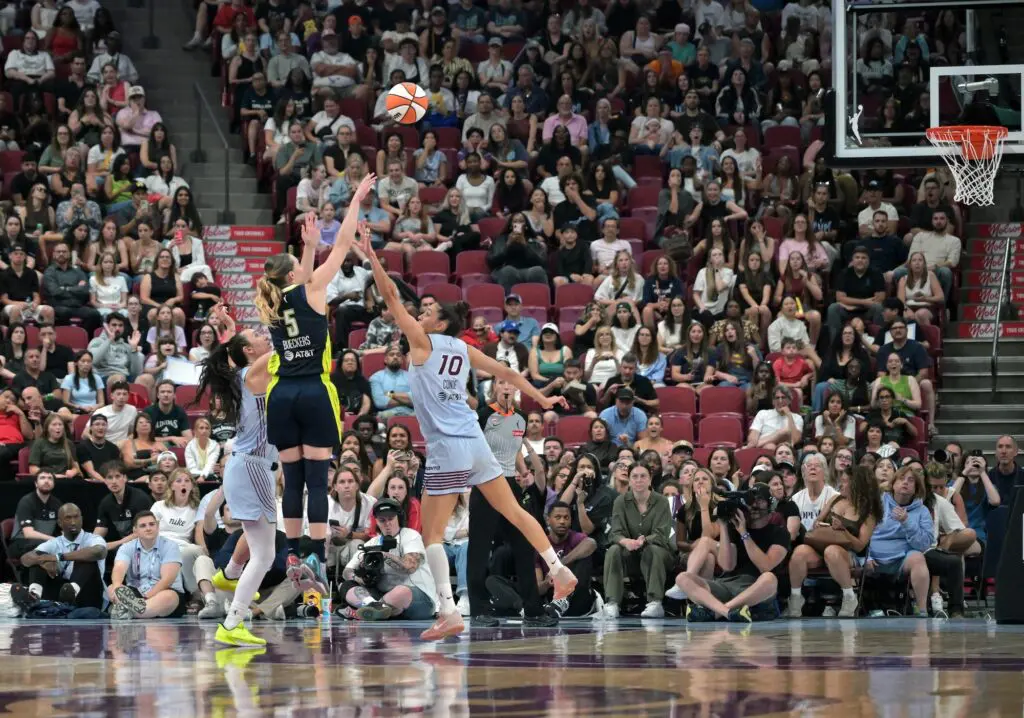 Dallas Wings guard Paige Bueckers (5) shoots a three pointer against the Toronto Tempo in the second half at the Bell Centre.