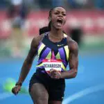 Sha'Carri Richardson celebrates after winning the women's 100m in 10.77 during the USATF Championships at Icahn Stadium.