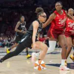 Minnesota Lynx guard Olivia Miles (5) drives to the basket as Indiana Fever center-forward Aliyah Boston (7) defends in the first quarter at Target Center.