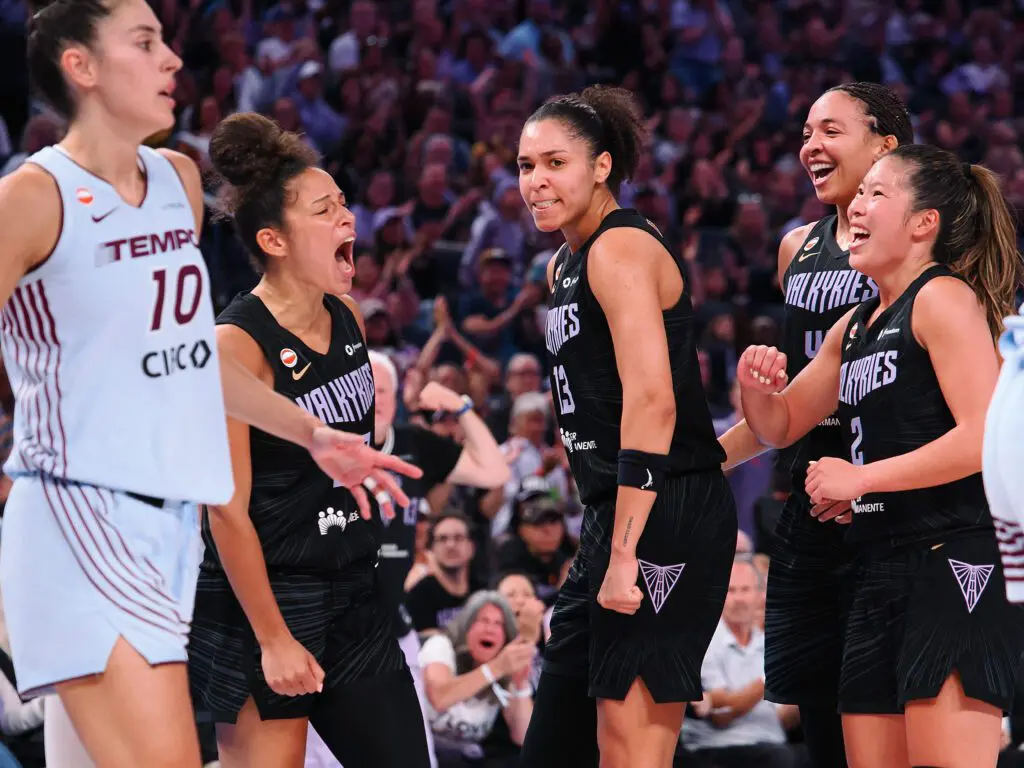 Golden State Valkyries forward Janelle Salaun (13) celebrates with teammates after a play against the Toronto Tempo during the third quarter at Chase Center.