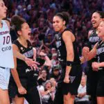 Golden State Valkyries forward Janelle Salaun (13) celebrates with teammates after a play against the Toronto Tempo during the third quarter at Chase Center.