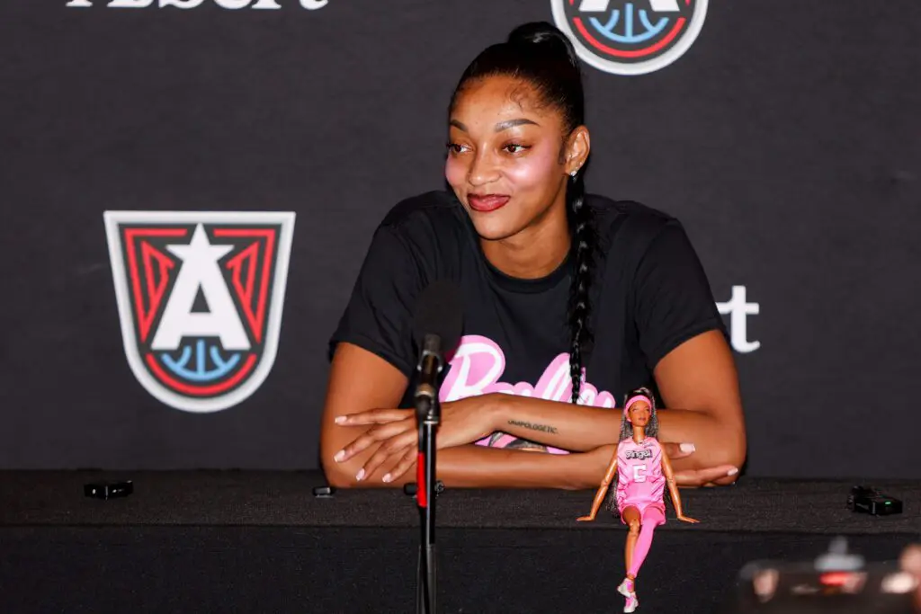 Atlanta Dream forward Angel Reese (5) talks about her signature Barbie doll before a game against the Las Vegas Aces at State Farm Arena.