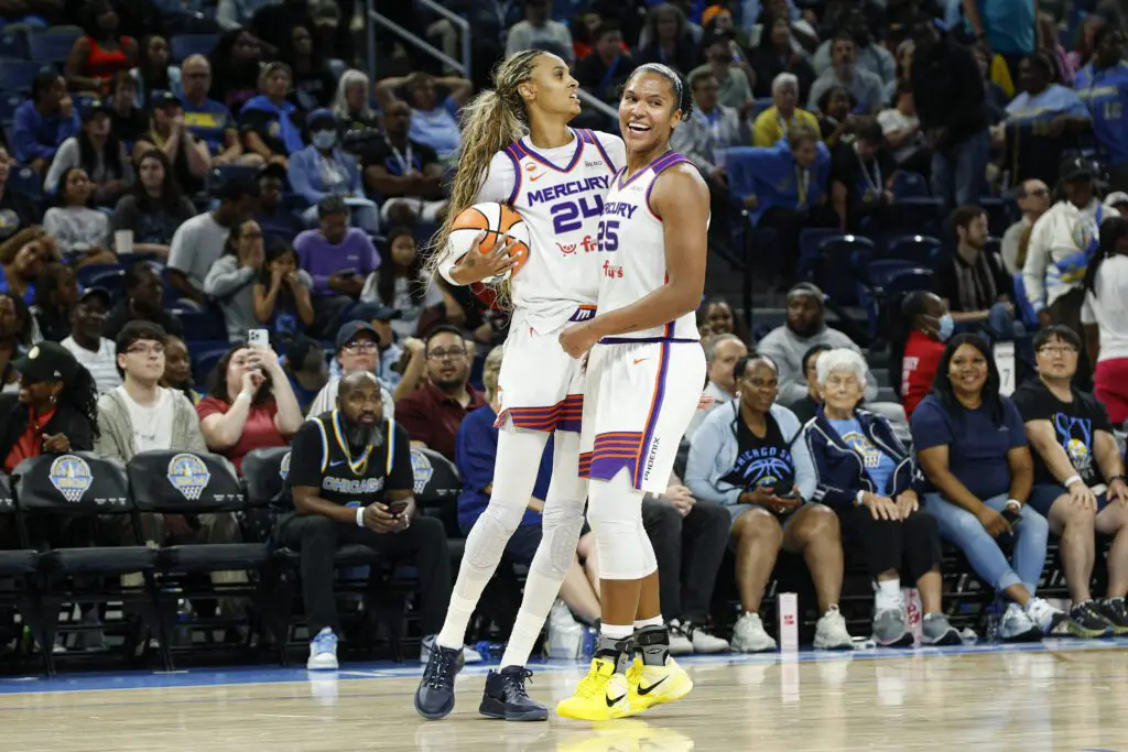 Phoenix Mercury forward DeWanna Bonner (24) celebrates with forward Alyssa Thomas (25) during the second half of a WNBA game against the Chicago Sky at Wintrust Arena.
