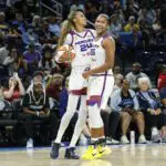Phoenix Mercury forward DeWanna Bonner (24) celebrates with forward Alyssa Thomas (25) during the second half of a WNBA game against the Chicago Sky at Wintrust Arena.