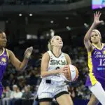 Chicago Sky guard Jacy Sheldon (0) goes to the basket against the Los Angeles Sparks.