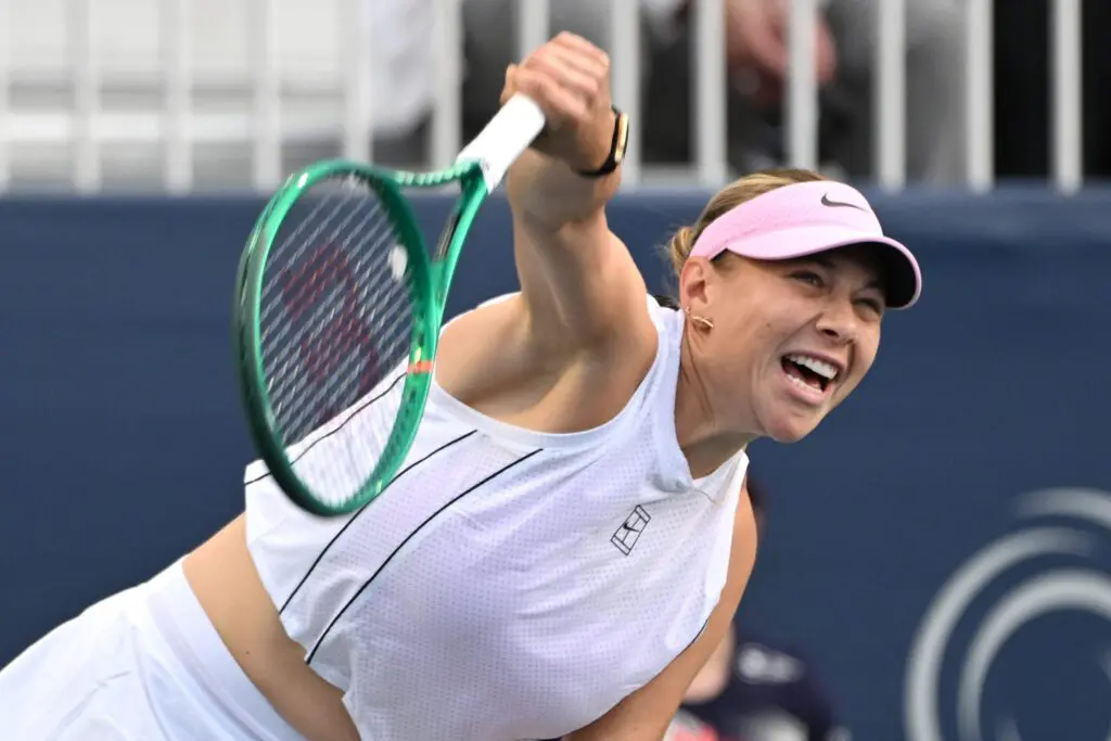 Amanda Anisimova (USA) serves against Nikola Bartunkova (CZE) during third round play at Sobeys Stadium.