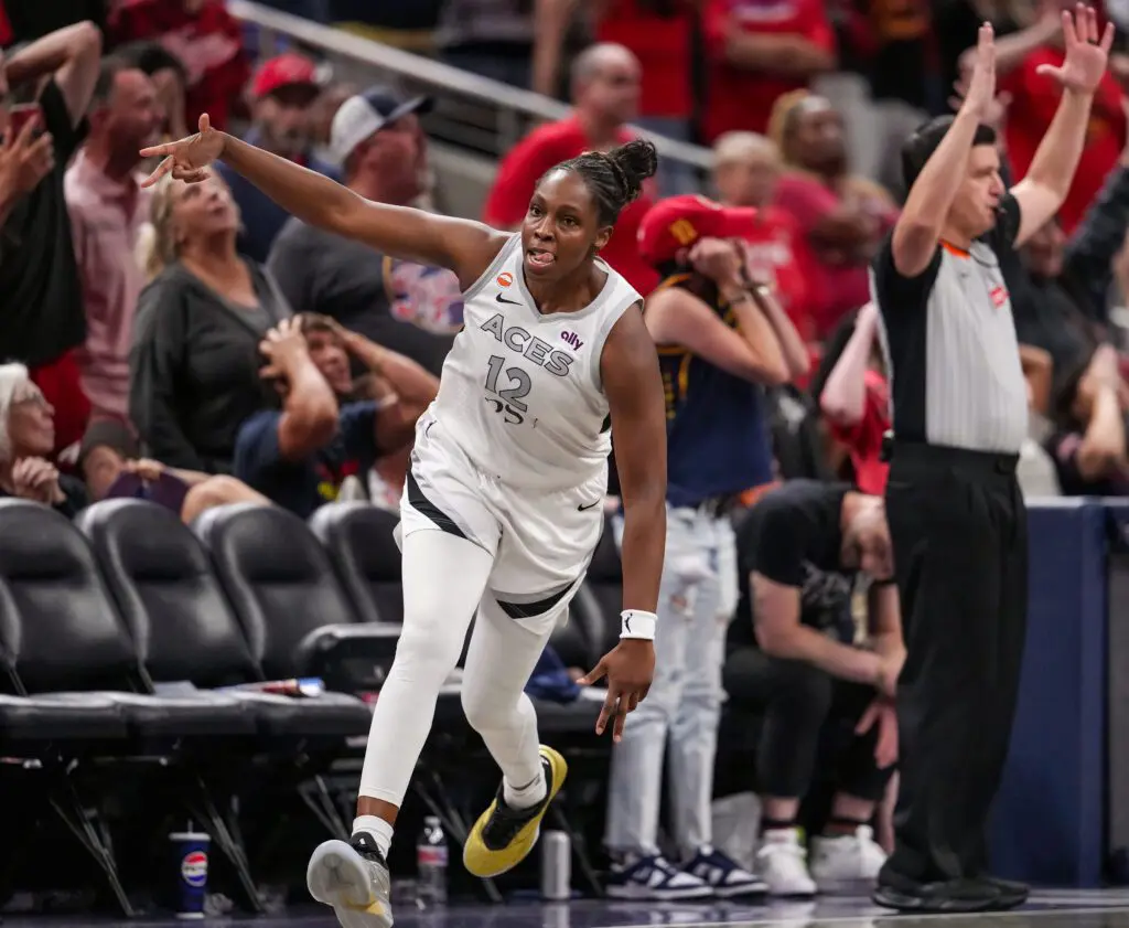 Las Vegas Aces guard Chelsea Gray (12) celebrates a three-point basket on Thursday, Aug. 6, 2026, during the game at Gainbridge Fieldhouse in Indianapolis.