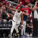Las Vegas Aces guard Chelsea Gray (12) celebrates a three-point basket on Thursday, Aug. 6, 2026, during the game at Gainbridge Fieldhouse in Indianapolis.