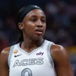 Las Vegas Aces guard Jackie Young (0) looks on in the first half against the Indiana Fever at Gainbridge Fieldhouse.