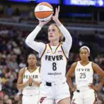 Indiana Fever guard Sophie Cunningham (8) shoots a free throw against the Chicago Sky during the first half of a WNBA game at United Center.