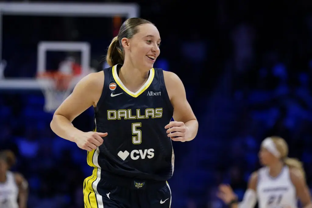 Dallas Wings guard Paige Bueckers (5) reacts after making her first basket of the game against the Toronto Tempo during the third quarter at College Park Center.