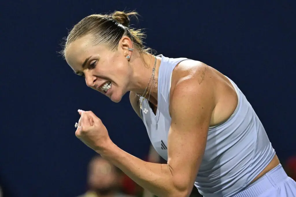 Elina Svitolina (UKR) reacts after playing a shot against Iga Swiatek (POL) during semi-final play at Sobeys Stadium.