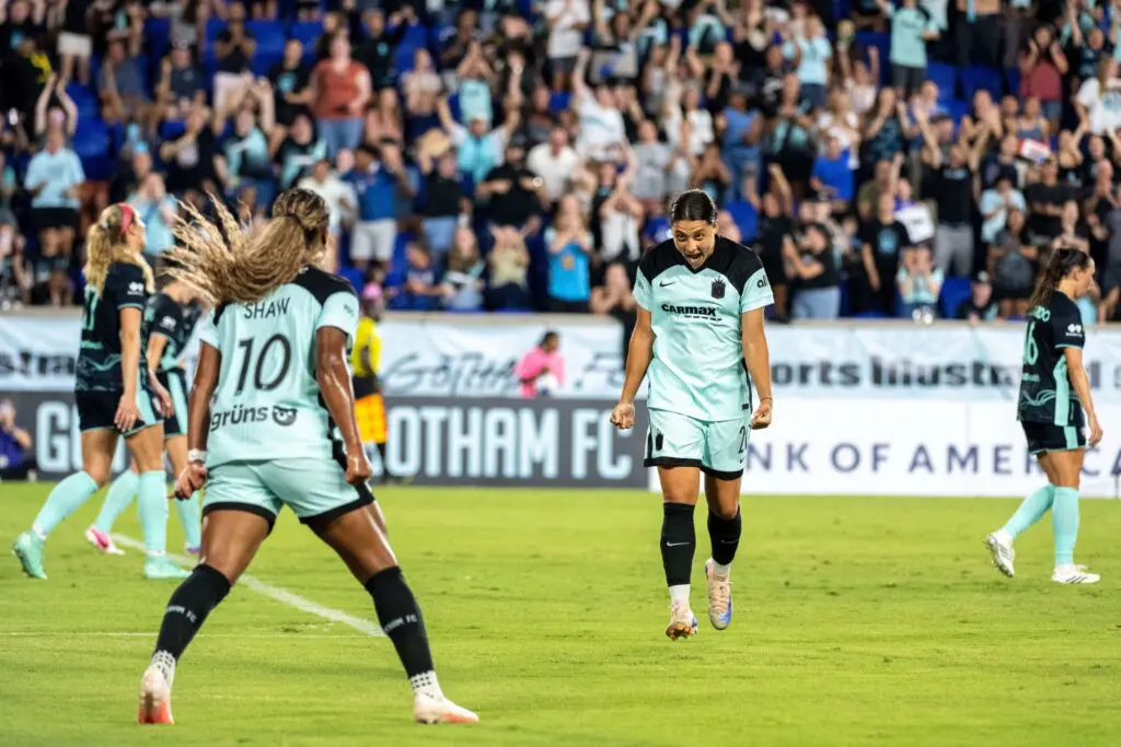 Gotham FC forward Sam Kerr (20) celebrates her goal with Gotham FC midfielder Jaedyn Shaw (10) during the first half against the Kansas City Current at Sports Illustrated Stadium.