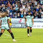Gotham FC forward Sam Kerr (20) celebrates her goal with Gotham FC midfielder Jaedyn Shaw (10) during the first half against the Kansas City Current at Sports Illustrated Stadium.