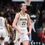 Indiana Fever guard Caitlin Clark (22) reacts against the Atlanta Dream during overtime at State Farm Arena.
