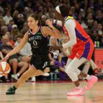 Portland Fire guard Carla Leite (0) drives to the basket against Phoenix Mercury guard Kahleah Copper in the second half at Mortgage Matchup Center.