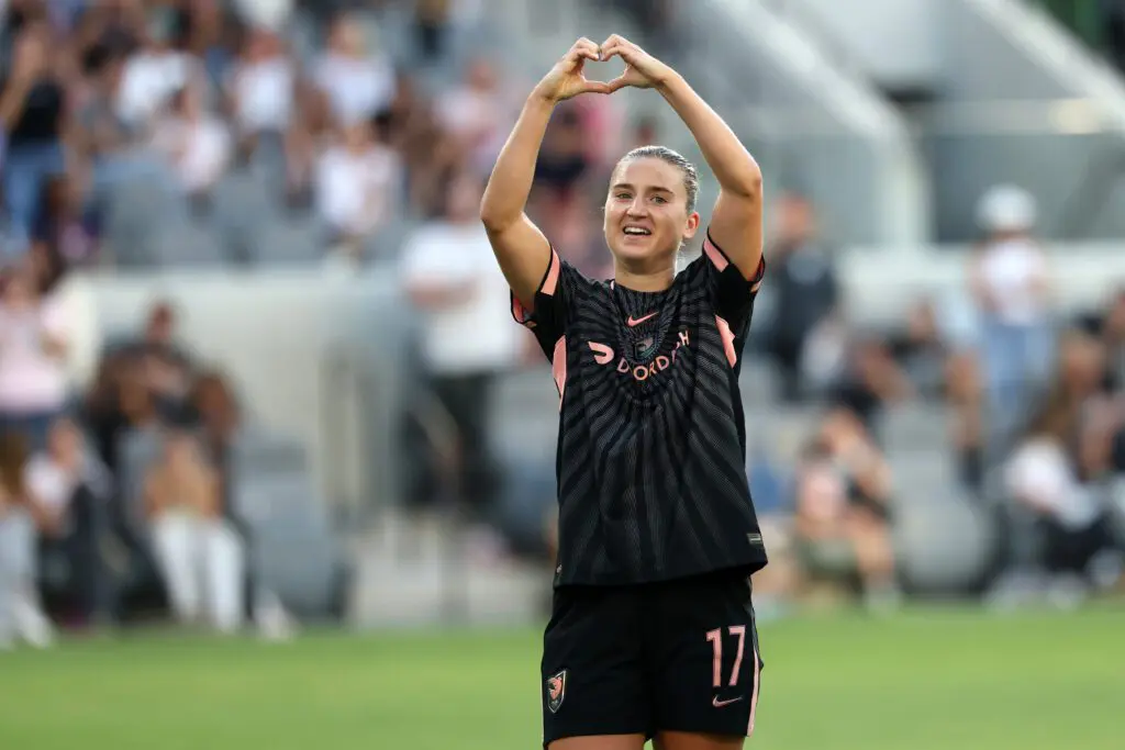 Angel City FC forward Ally Sentnor (17) celebrates after scoring a goal that was later disallowed following a video review for a handball during the first half against the Washington Spirit at BMO Stadium.